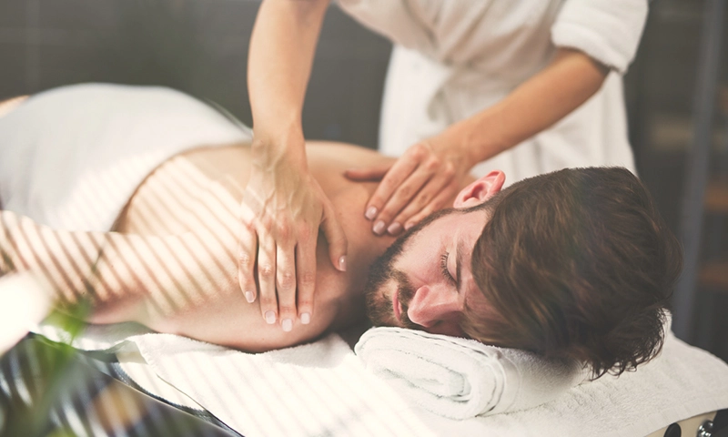 Man having back massage at the health spa