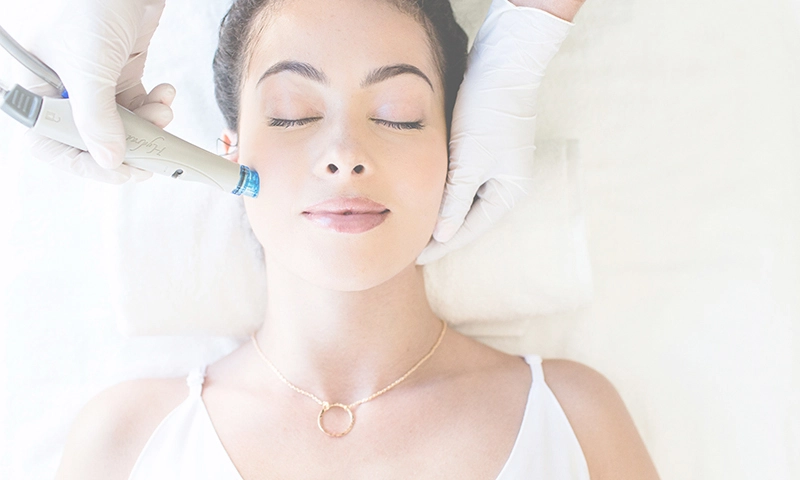 woman receiving a HydraFacial treament