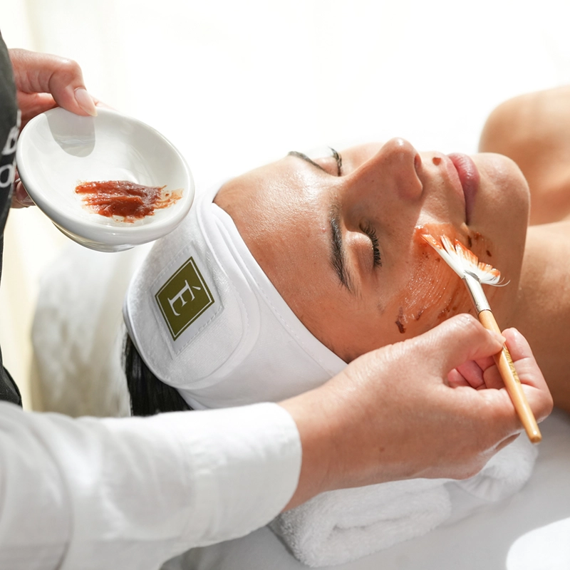 Shot of an attractive young woman getting an Eminence facial at a beauty day spa